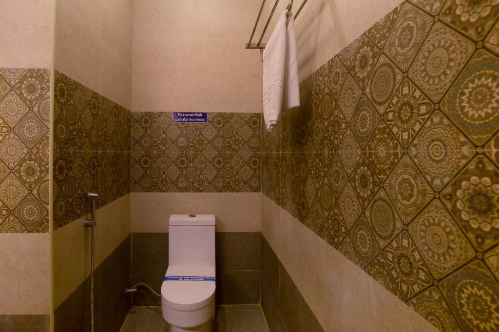 Koupelna v ubytování Manjhi Residency