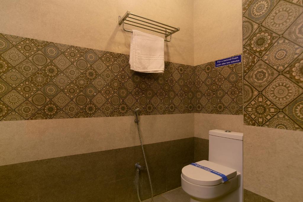 Koupelna v ubytování Manjhi Residency