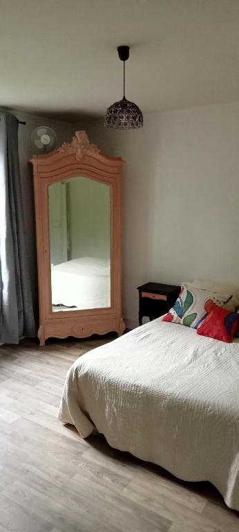Postel nebo postele na pokoji v ubytování Tulipe