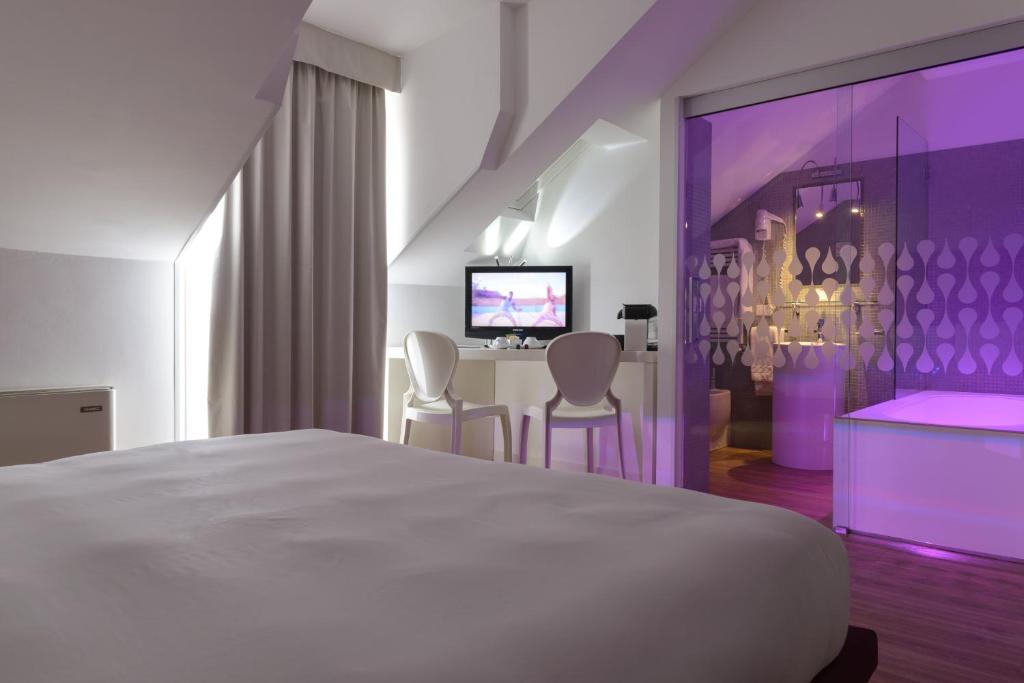 Postel nebo postele na pokoji v ubytování Elite Hotel & Spa