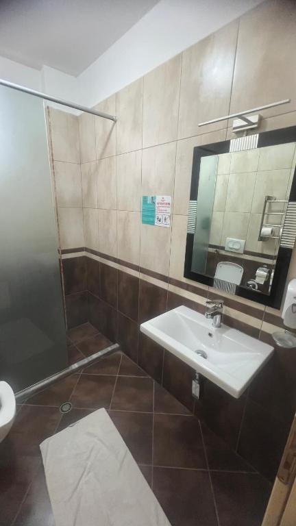 Koupelna v ubytování Sunrise Hotel Cameria