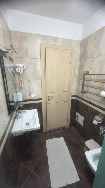 Koupelna v ubytování Sunrise Hotel Cameria