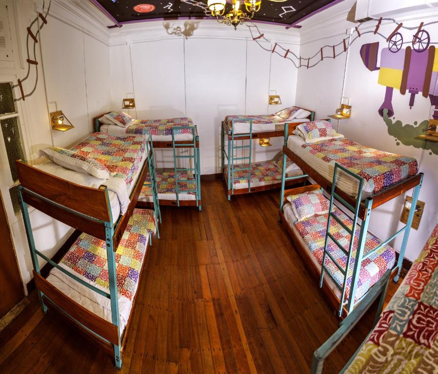 Postel nebo postele na pokoji v ubytování Nómada Eco-Hostal