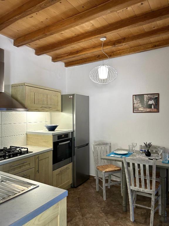 Kuchyň nebo kuchyňský kout v ubytování Villa Pounta Family