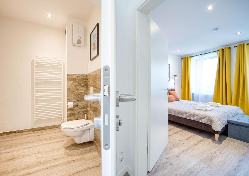 Postel nebo postele na pokoji v ubytování VonMos Moselblick Apartments