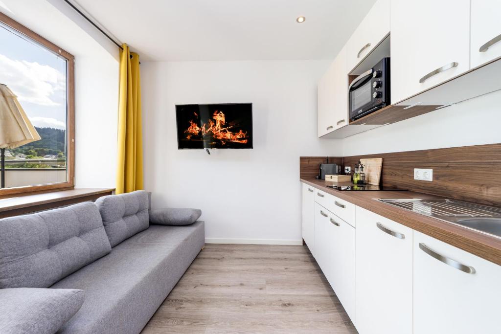 Kuchyň nebo kuchyňský kout v ubytování VonMos Moselblick Apartments