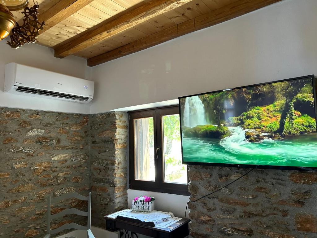 TV a/nebo společenská místnost v ubytování Villa Pounta Family