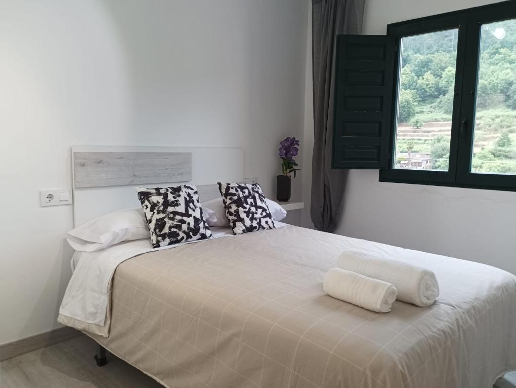 Ένα ή περισσότερα κρεβάτια σε δωμάτιο στο Casa dos avós