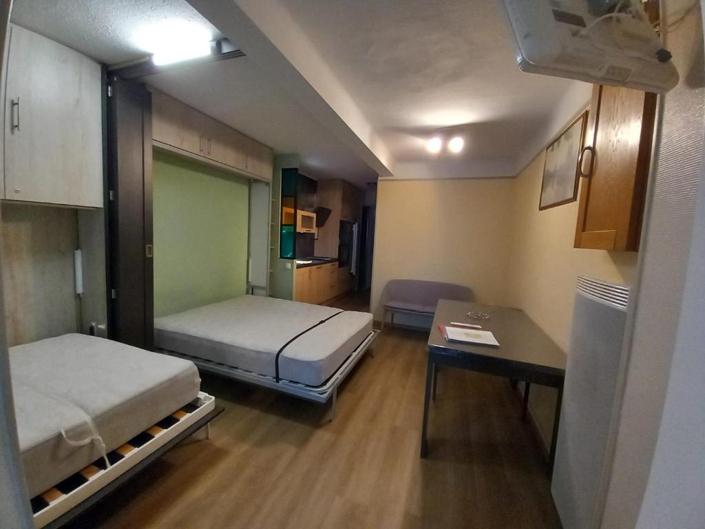 Postel nebo postele na pokoji v ubytování Altissim Tres Estrelles