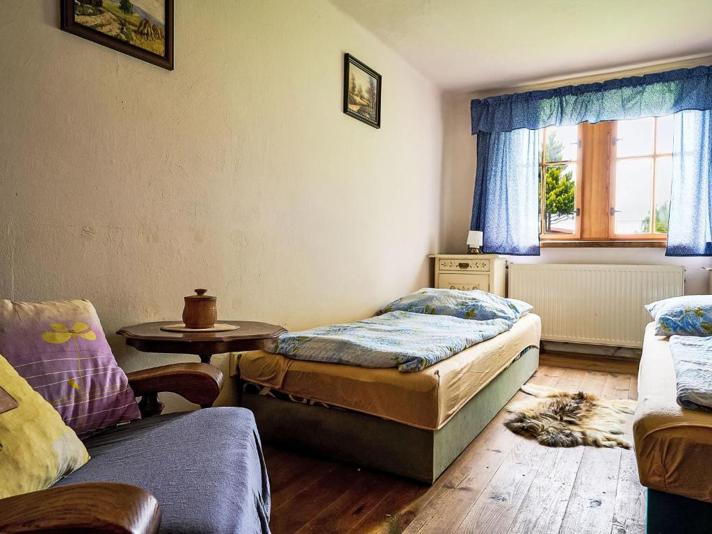 Postel nebo postele na pokoji v ubytování Holiday Home Na kopečku by Interhome