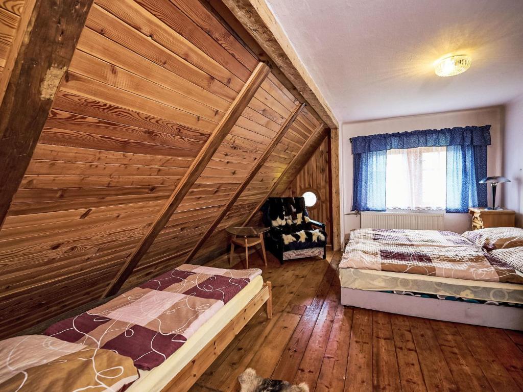 Postel nebo postele na pokoji v ubytování Holiday Home Na kopečku by Interhome