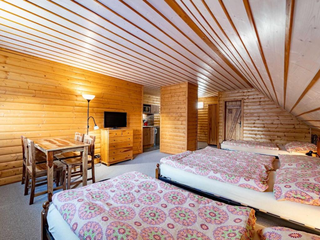 Postel nebo postele na pokoji v ubytování Holiday Home Chalupa U Bobra-1 by Interhome