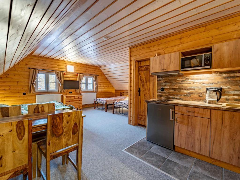 Kuchyň nebo kuchyňský kout v ubytování Holiday Home Chalupa U Bobra-1 by Interhome