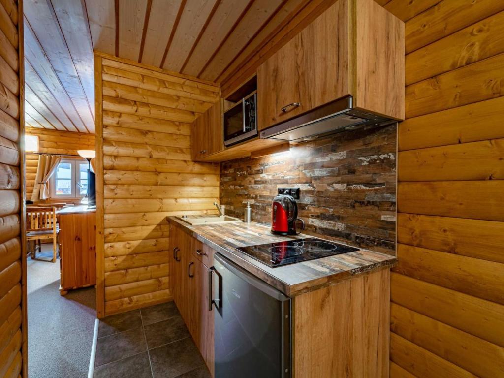 Kuchyň nebo kuchyňský kout v ubytování Holiday Home Chalupa U Bobra-1 by Interhome