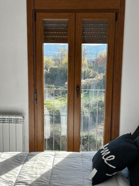 Postel nebo postele na pokoji v ubytování Hostal Rural Sartaguda
