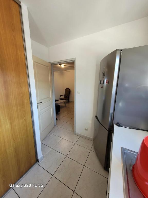 Kuchyň nebo kuchyňský kout v ubytování Côte ouest - Appartement F3