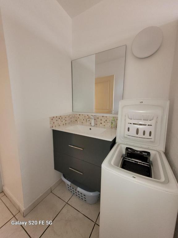 Kuchyň nebo kuchyňský kout v ubytování Côte ouest - Appartement F3