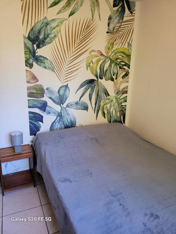 Postel nebo postele na pokoji v ubytování Côte ouest - Appartement F3