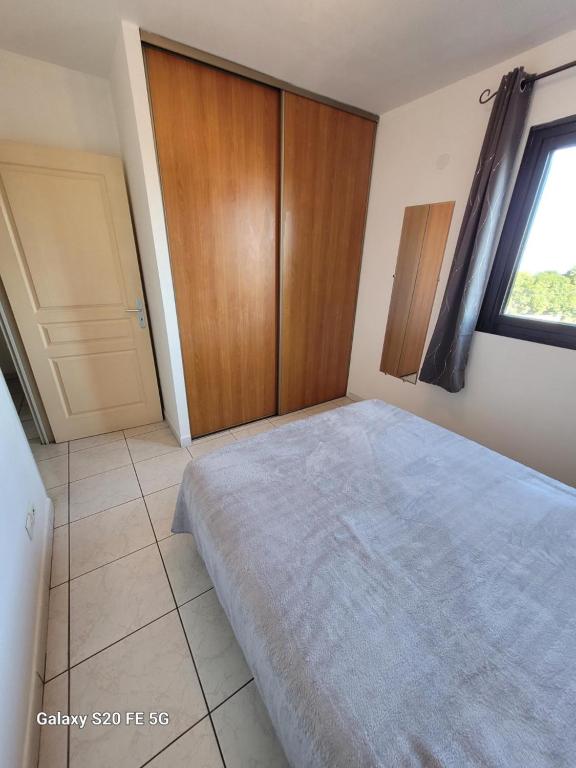 Postel nebo postele na pokoji v ubytování Côte ouest - Appartement F3