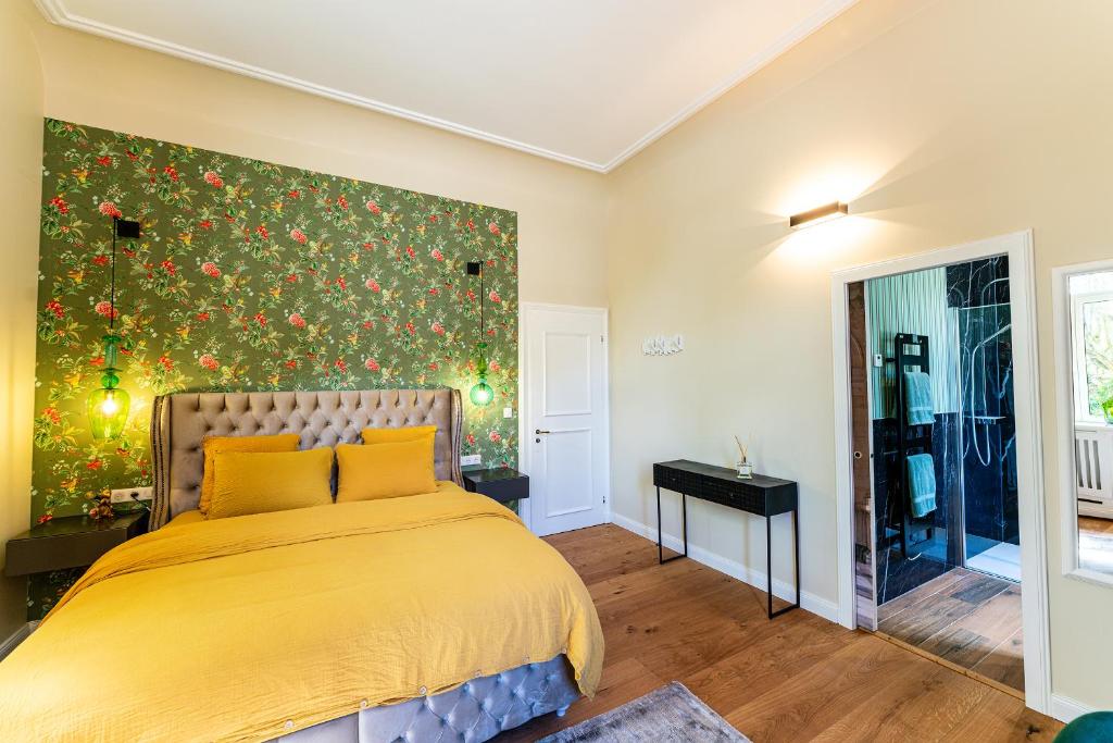 Postel nebo postele na pokoji v ubytování Villa Magnolia Wissembourg