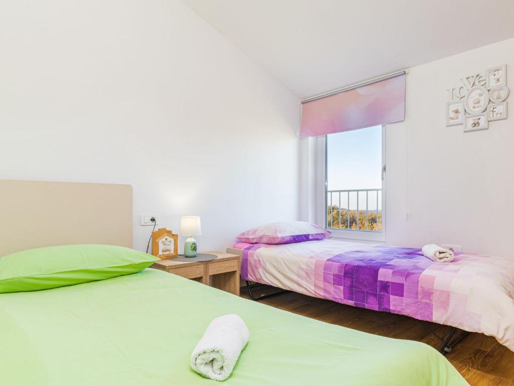 Posteľ alebo postele v izbe v ubytovaní Holiday Home Villa May by Interhome