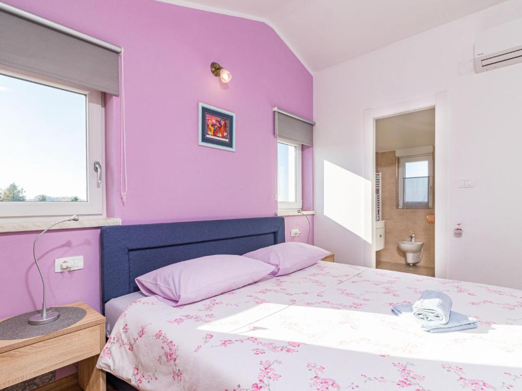 Posteľ alebo postele v izbe v ubytovaní Holiday Home Villa May by Interhome