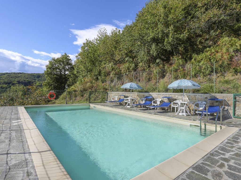 Πισίνα στο ή κοντά στο Apartment Capanna - CNG175 by Interhome