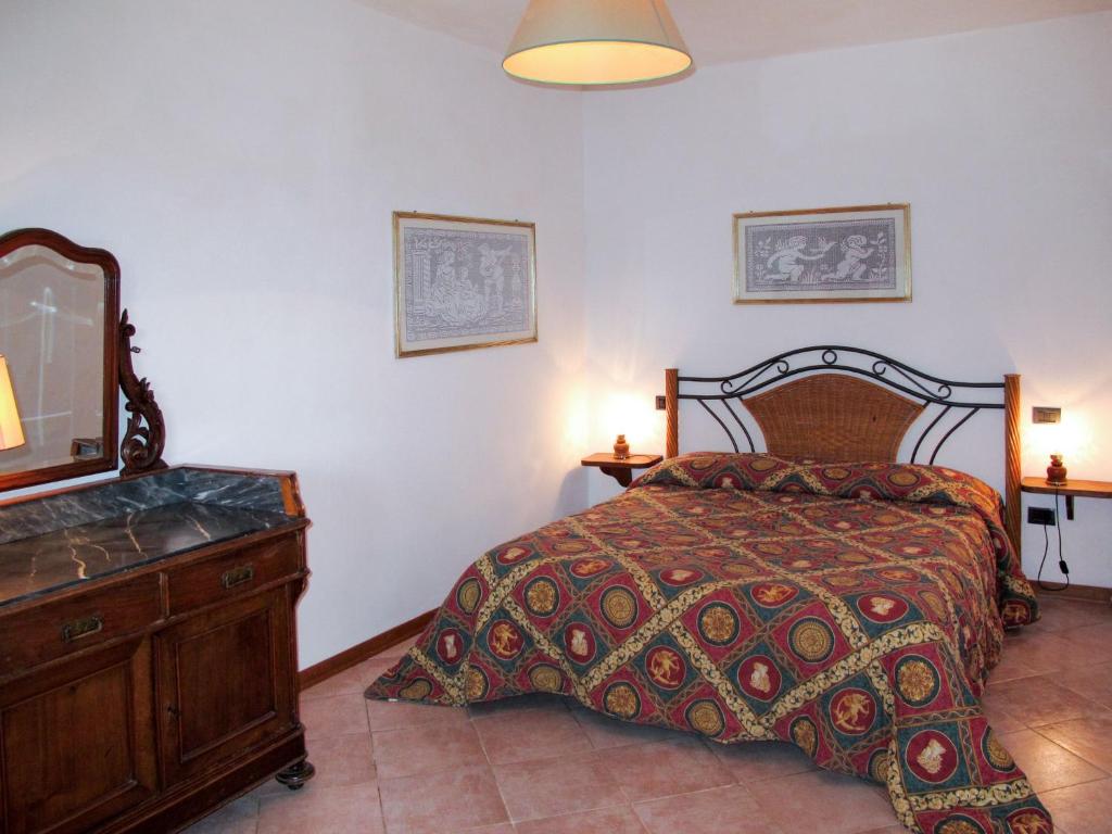 Posteľ alebo postele v izbe v ubytovaní Apartment Rondini by Interhome