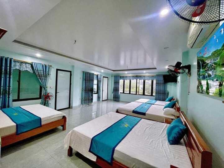 En eller flere senge i et værelse på Thu Thủy Hotel