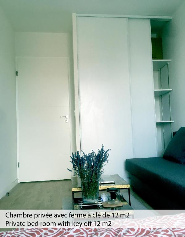 Posezení v ubytování Chambre privée dans un roof-top unique
