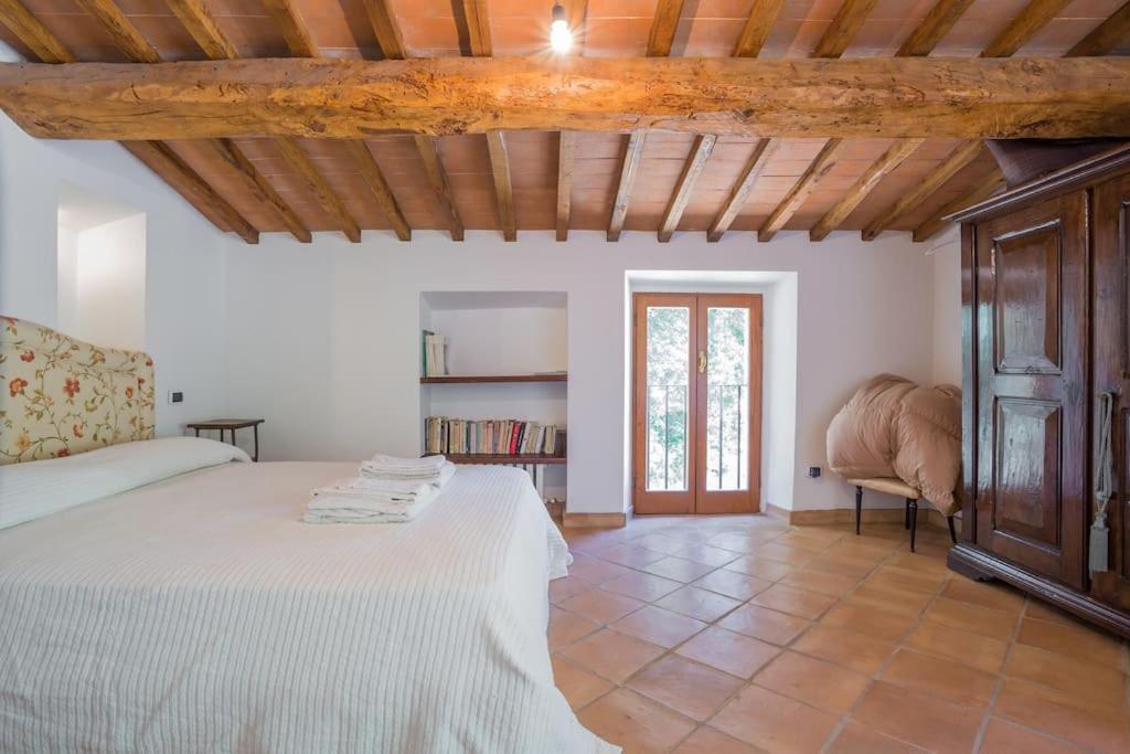 Postel nebo postele na pokoji v ubytování Casale in Val D Orcia