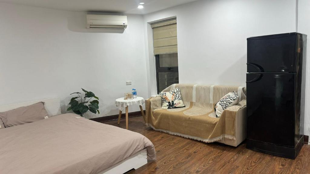 Voodi või voodid majutusasutuse Bom's House toas