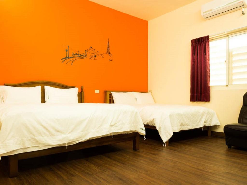 Postel nebo postele na pokoji v ubytování Lin Tea B&B
