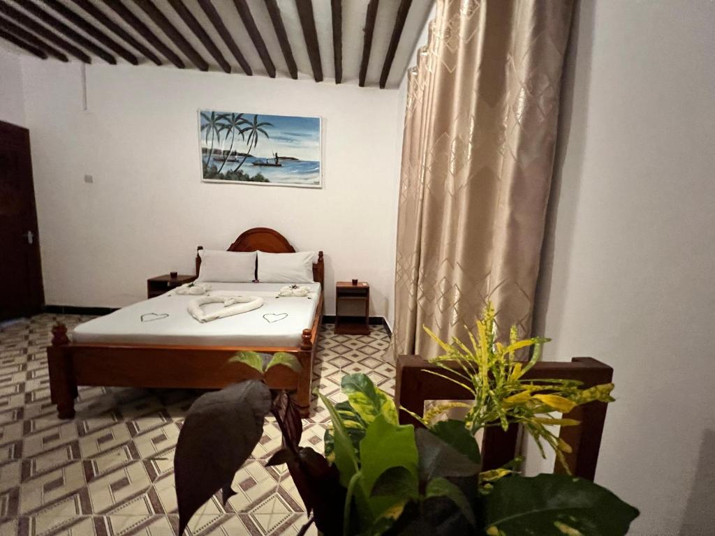 Postel nebo postele na pokoji v ubytování wannas house
