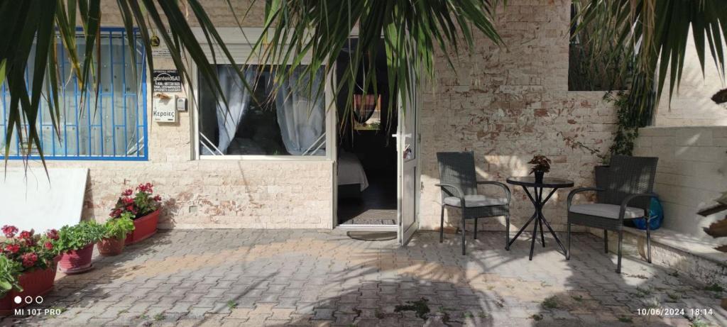Posezení v ubytování Billy's Luxury Suites - 1 by Booking Kottas - Kriopigi