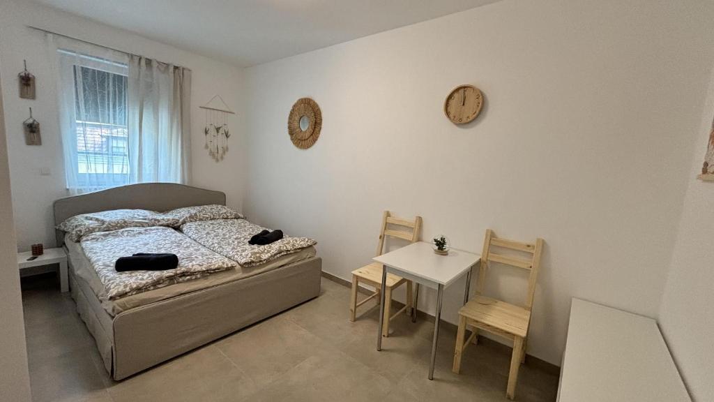 Postel nebo postele na pokoji v ubytování Langenzersdorf Apartment