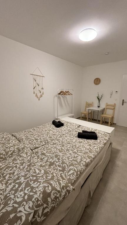 Postel nebo postele na pokoji v ubytování Langenzersdorf Apartment