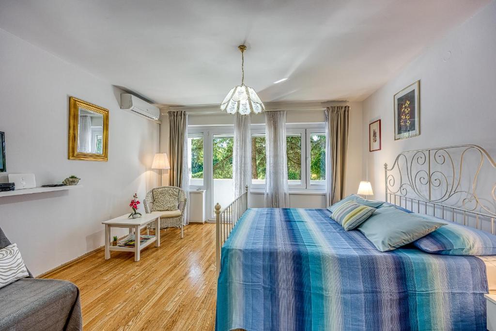 Posteľ alebo postele v izbe v ubytovaní Apartment Dragica