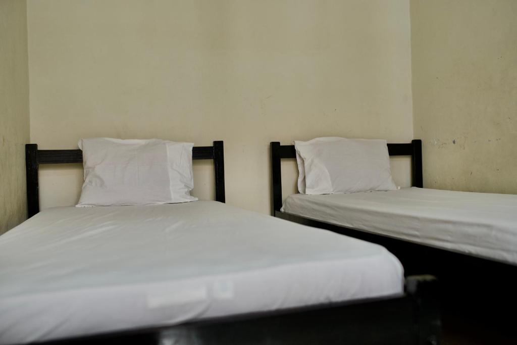 Katil atau katil-katil dalam bilik di Garuda Setia Hotel