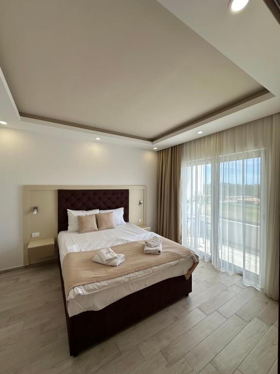 Postel nebo postele na pokoji v ubytování Heaven Lux Ulcinj