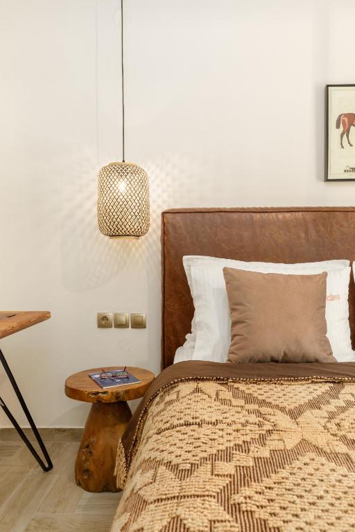 Postel nebo postele na pokoji v ubytování Meydani Suites
