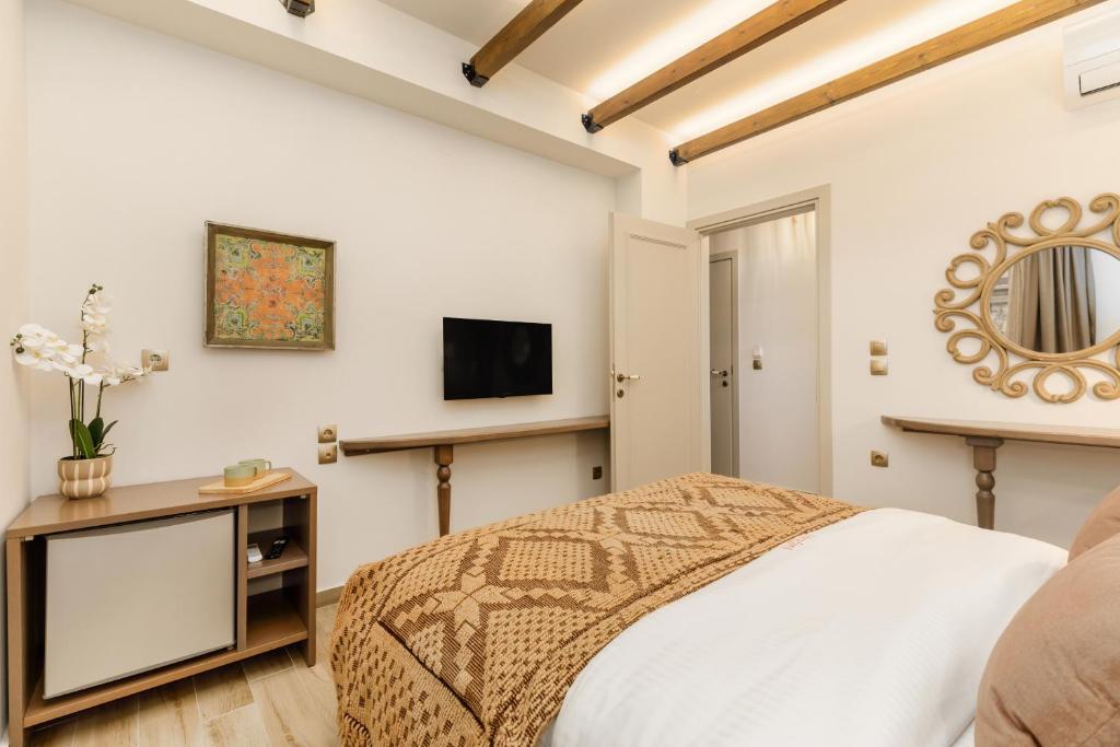 TV a/nebo společenská místnost v ubytování Meydani Suites