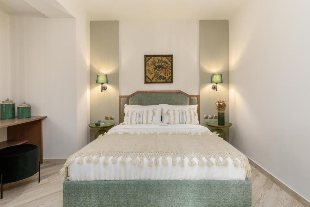 Postel nebo postele na pokoji v ubytování Meydani Suites