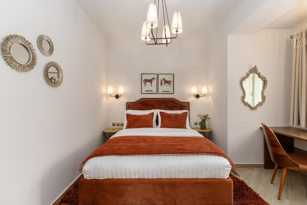 Postel nebo postele na pokoji v ubytování Meydani Suites