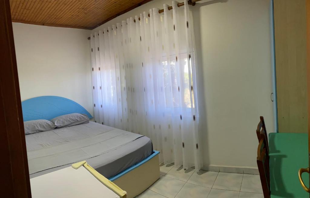 Postel nebo postele na pokoji v ubytování Te Toni Divjake