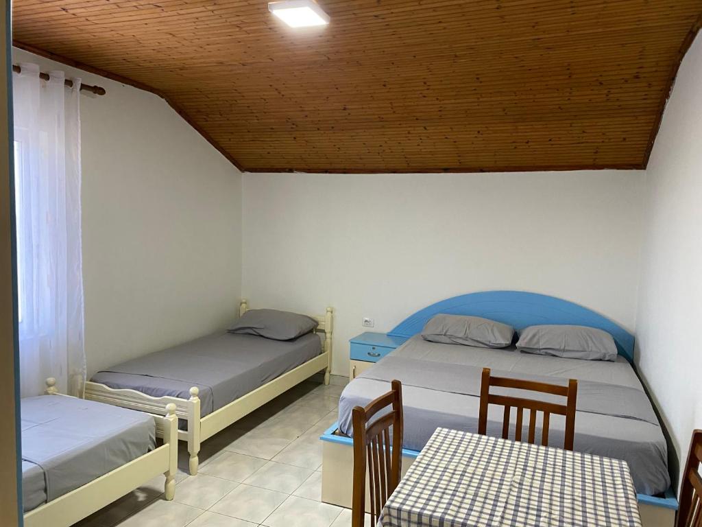 Postel nebo postele na pokoji v ubytování Te Toni Divjake