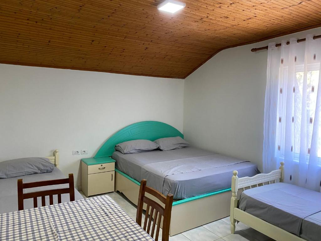 Postel nebo postele na pokoji v ubytování Te Toni Divjake