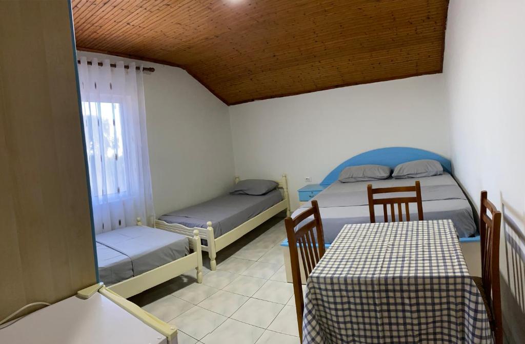 Postel nebo postele na pokoji v ubytování Te Toni Divjake