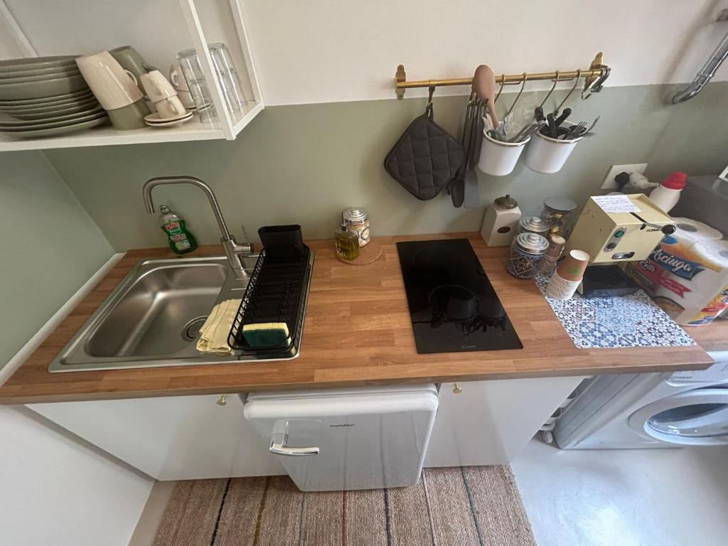 Kuchyň nebo kuchyňský kout v ubytování Aporti Home