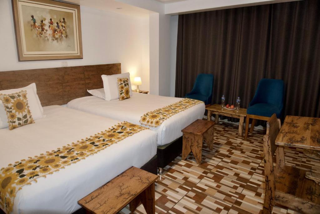 Voodi või voodid majutusasutuse Hotel Tara Machupicchu toas